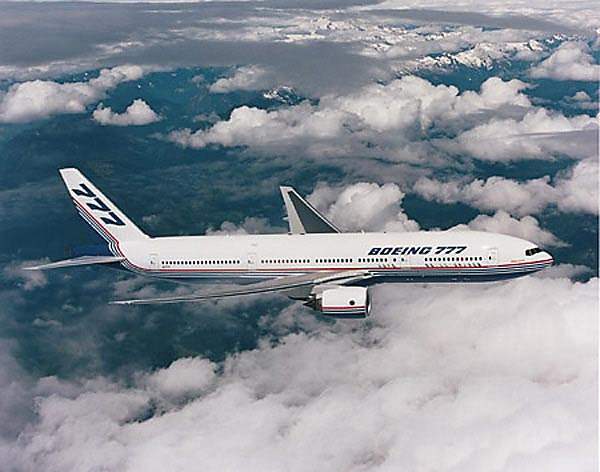 The Boeing 777-200 seats between 305 and 328 passengers in a typical three-class configuration.